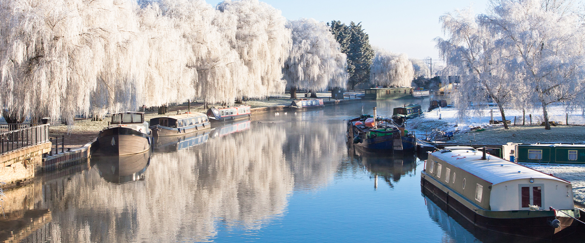 Winter landscape canal boats in UK
